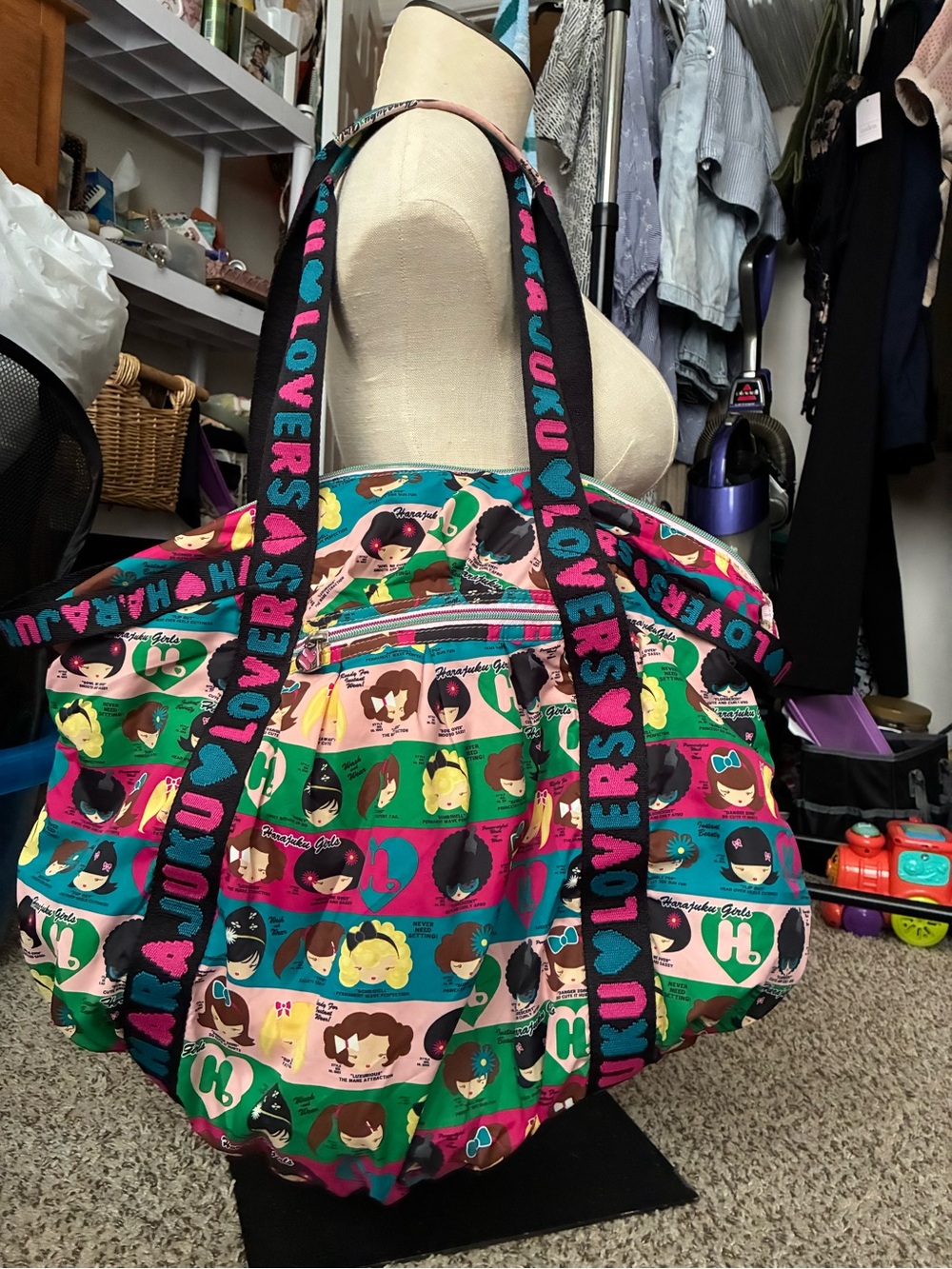 This is a vintage Harajuku Lovers polyester shoulder tote bag a multicolor